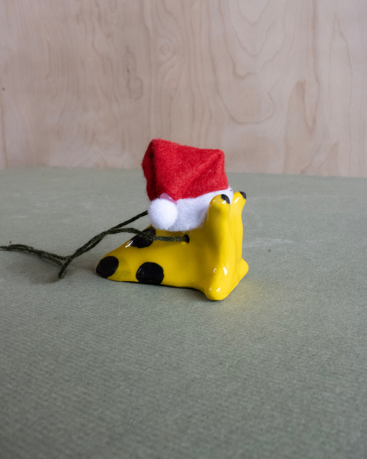 Ceramic Banana Slug Santa Ornament