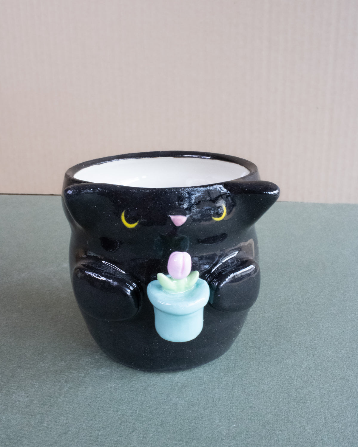 Cat Planter Holding Tulip